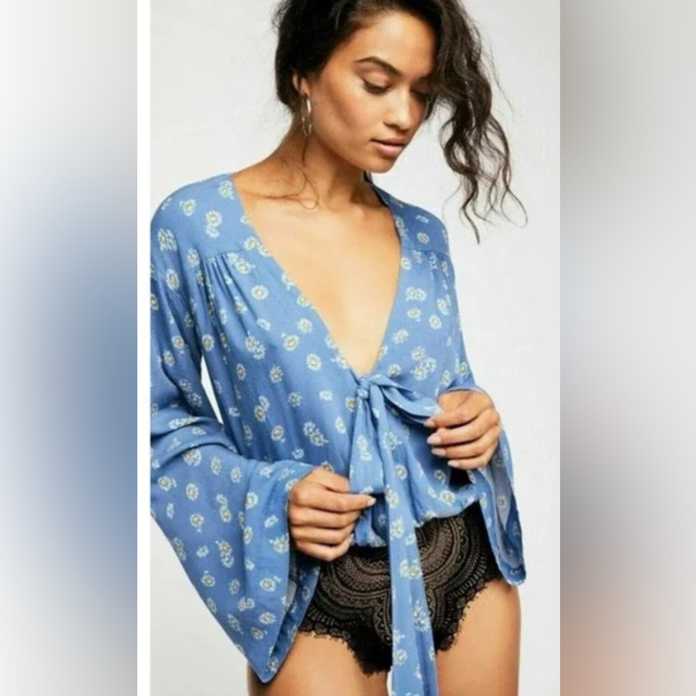 NWT FREE PEOPLE DAISY BLOUSE BODYSUIT.  SUPER CUTE AND OVERSIZED